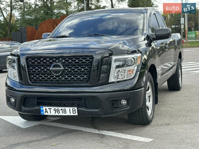 Черный Ниссан Титан, объемом двигателя 5.55 л и пробегом 47 тыс. км за 24900 $, фото 12 на Automoto.ua