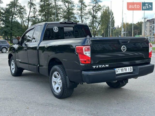 Черный Ниссан Титан, объемом двигателя 5.55 л и пробегом 47 тыс. км за 24900 $, фото 4 на Automoto.ua