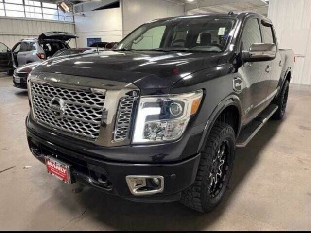 Черный Ниссан Титан, объемом двигателя 5.5 л и пробегом 150 тыс. км за 25000 $, фото 6 на Automoto.ua