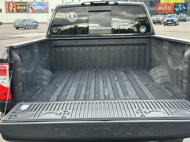 Черный Ниссан Титан, объемом двигателя 5.55 л и пробегом 47 тыс. км за 24900 $, фото 17 на Automoto.ua