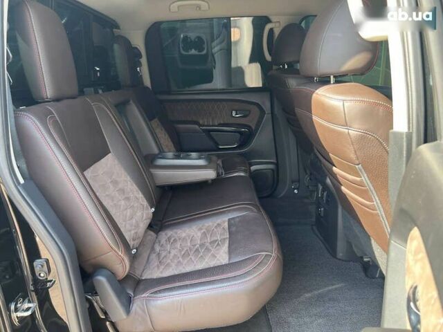 Черный Ниссан Титан, объемом двигателя 5.6 л и пробегом 69 тыс. км за 39999 $, фото 11 на Automoto.ua