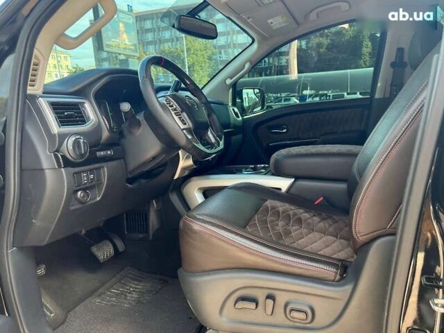 Черный Ниссан Титан, объемом двигателя 5.6 л и пробегом 69 тыс. км за 39999 $, фото 6 на Automoto.ua