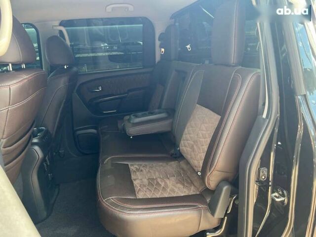 Черный Ниссан Титан, объемом двигателя 5.6 л и пробегом 69 тыс. км за 39999 $, фото 13 на Automoto.ua