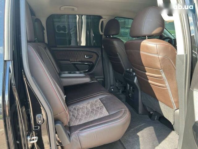 Черный Ниссан Титан, объемом двигателя 5.6 л и пробегом 69 тыс. км за 39999 $, фото 10 на Automoto.ua