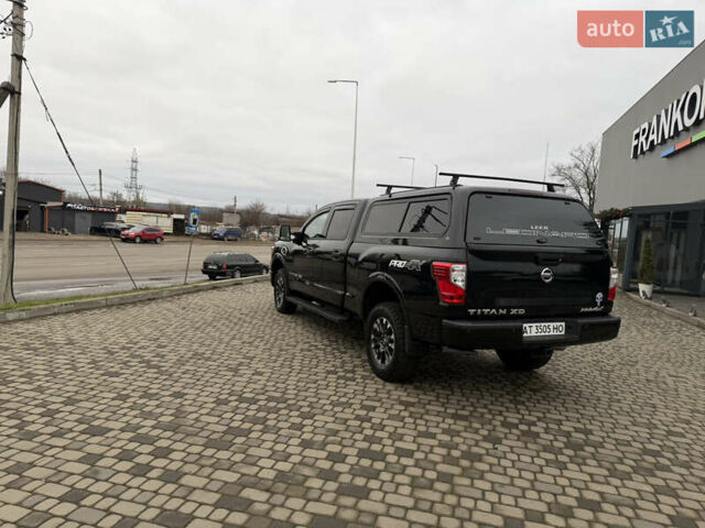 Чорний Ніссан Титан, об'ємом двигуна 5 л та пробігом 79 тис. км за 52000 $, фото 6 на Automoto.ua