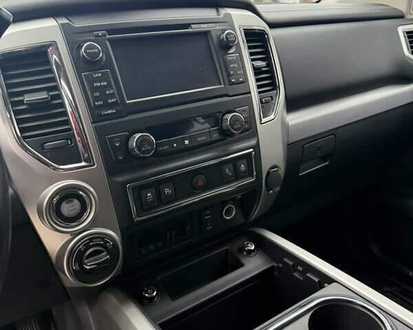 Чорний Ніссан Титан, об'ємом двигуна 5 л та пробігом 79 тис. км за 52000 $, фото 10 на Automoto.ua