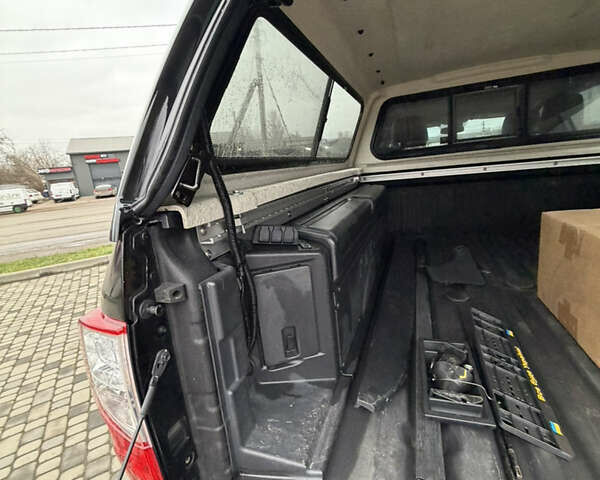 Чорний Ніссан Титан, об'ємом двигуна 5 л та пробігом 79 тис. км за 52000 $, фото 21 на Automoto.ua