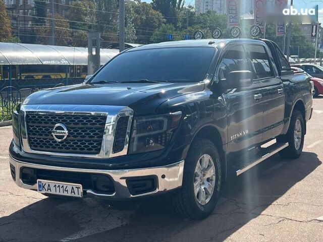 Черный Ниссан Титан, объемом двигателя 5.6 л и пробегом 69 тыс. км за 39999 $, фото 1 на Automoto.ua