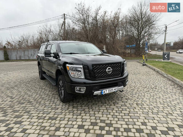 Чорний Ніссан Титан, об'ємом двигуна 5 л та пробігом 79 тис. км за 52000 $, фото 2 на Automoto.ua