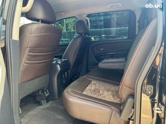Черный Ниссан Титан, объемом двигателя 5.6 л и пробегом 69 тыс. км за 39999 $, фото 12 на Automoto.ua