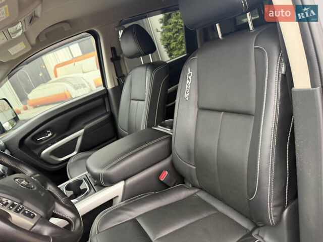 Чорний Ніссан Титан, об'ємом двигуна 5 л та пробігом 79 тис. км за 52000 $, фото 14 на Automoto.ua