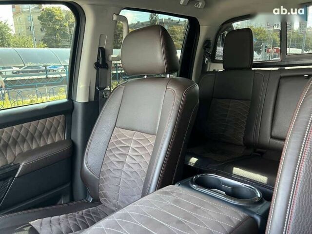 Черный Ниссан Титан, объемом двигателя 5.6 л и пробегом 69 тыс. км за 39999 $, фото 22 на Automoto.ua