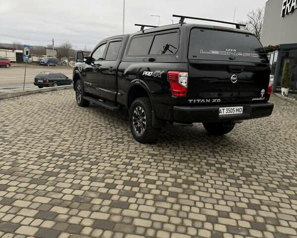 Чорний Ніссан Титан, об'ємом двигуна 5 л та пробігом 79 тис. км за 52000 $, фото 7 на Automoto.ua