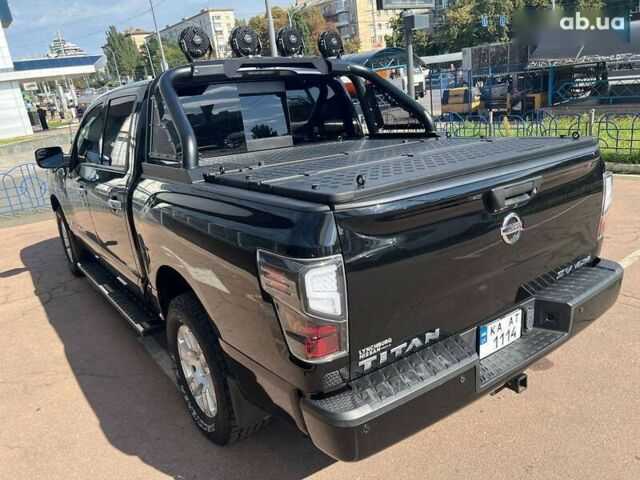Черный Ниссан Титан, объемом двигателя 5.6 л и пробегом 69 тыс. км за 39999 $, фото 27 на Automoto.ua
