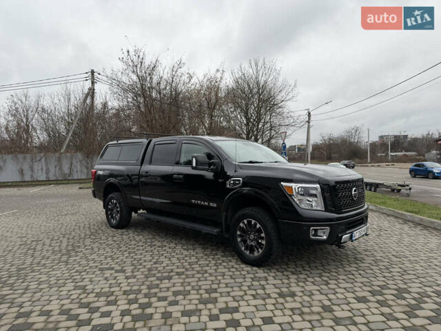 Чорний Ніссан Титан, об'ємом двигуна 5 л та пробігом 79 тис. км за 52000 $, фото 3 на Automoto.ua