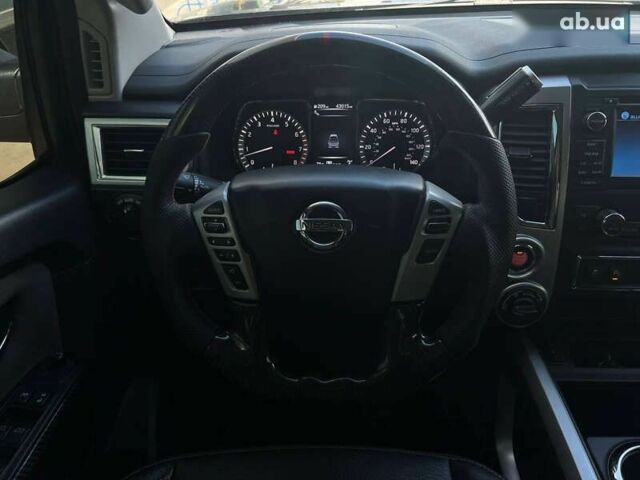 Черный Ниссан Титан, объемом двигателя 5.6 л и пробегом 69 тыс. км за 39999 $, фото 16 на Automoto.ua