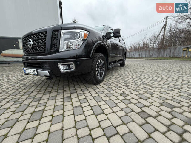 Чорний Ніссан Титан, об'ємом двигуна 5 л та пробігом 79 тис. км за 52000 $, фото 1 на Automoto.ua