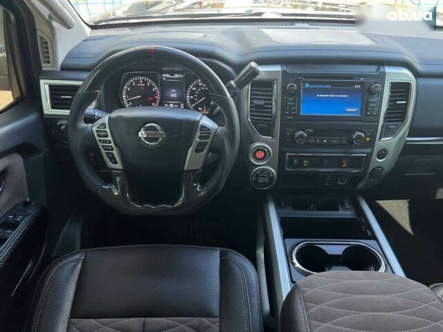 Черный Ниссан Титан, объемом двигателя 5.6 л и пробегом 69 тыс. км за 39999 $, фото 15 на Automoto.ua