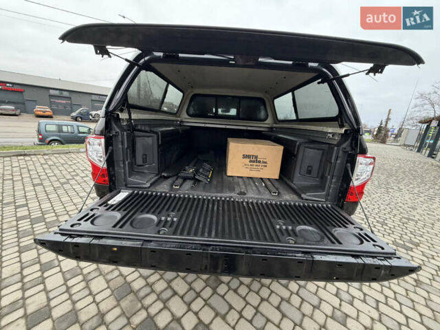 Чорний Ніссан Титан, об'ємом двигуна 5 л та пробігом 79 тис. км за 52000 $, фото 20 на Automoto.ua