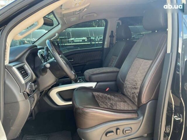 Черный Ниссан Титан, объемом двигателя 5.6 л и пробегом 69 тыс. км за 39999 $, фото 7 на Automoto.ua