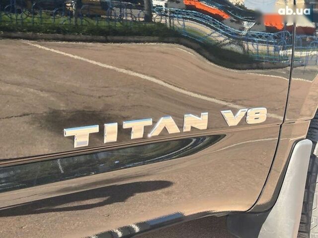 Черный Ниссан Титан, объемом двигателя 5.6 л и пробегом 69 тыс. км за 39999 $, фото 29 на Automoto.ua