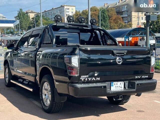 Черный Ниссан Титан, объемом двигателя 5.6 л и пробегом 69 тыс. км за 39999 $, фото 4 на Automoto.ua