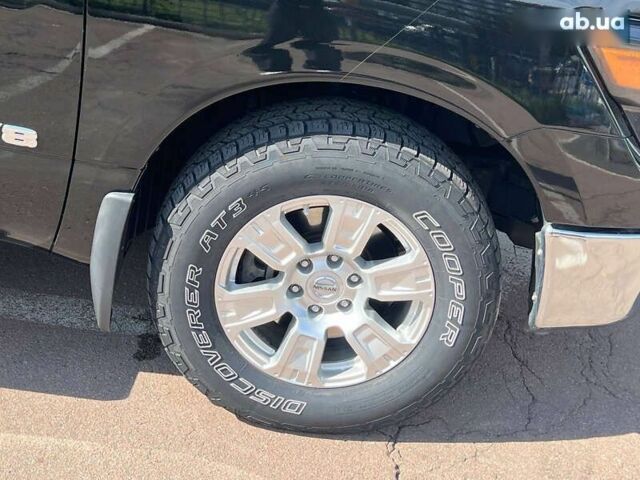 Черный Ниссан Титан, объемом двигателя 5.6 л и пробегом 69 тыс. км за 39999 $, фото 20 на Automoto.ua