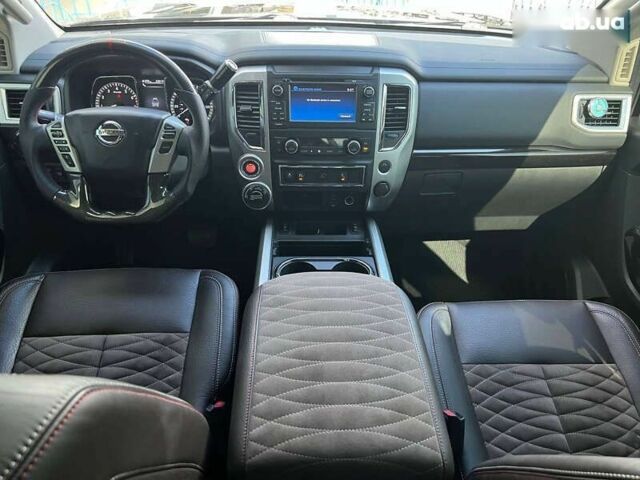 Черный Ниссан Титан, объемом двигателя 5.6 л и пробегом 69 тыс. км за 39999 $, фото 14 на Automoto.ua
