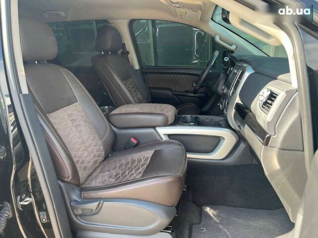 Черный Ниссан Титан, объемом двигателя 5.6 л и пробегом 69 тыс. км за 39999 $, фото 8 на Automoto.ua