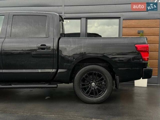 Черный Ниссан Титан, объемом двигателя 5.56 л и пробегом 160 тыс. км за 29999 $, фото 7 на Automoto.ua