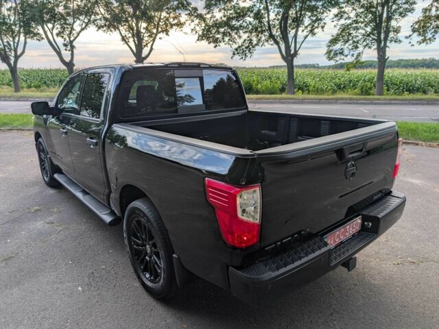 Черный Ниссан Титан, объемом двигателя 5.6 л и пробегом 160 тыс. км за 26999 $, фото 17 на Automoto.ua