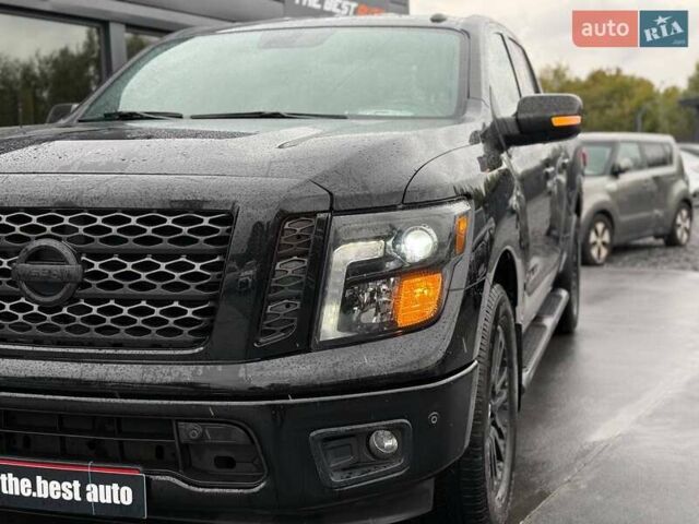 Черный Ниссан Титан, объемом двигателя 5.56 л и пробегом 160 тыс. км за 29999 $, фото 15 на Automoto.ua