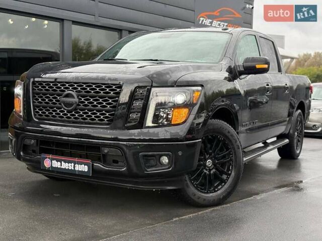 Черный Ниссан Титан, объемом двигателя 5.56 л и пробегом 160 тыс. км за 29999 $, фото 1 на Automoto.ua
