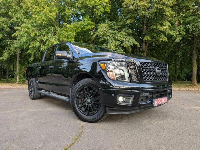Черный Ниссан Титан, объемом двигателя 5.6 л и пробегом 160 тыс. км за 26999 $, фото 5 на Automoto.ua