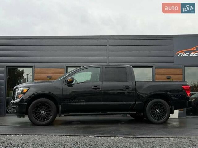 Черный Ниссан Титан, объемом двигателя 5.56 л и пробегом 160 тыс. км за 29999 $, фото 5 на Automoto.ua