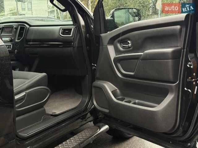 Черный Ниссан Титан, объемом двигателя 5.56 л и пробегом 160 тыс. км за 29999 $, фото 57 на Automoto.ua