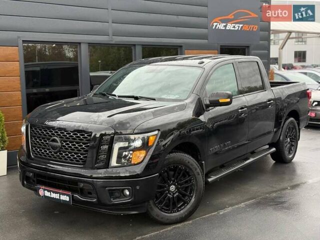 Черный Ниссан Титан, объемом двигателя 5.56 л и пробегом 160 тыс. км за 29999 $, фото 2 на Automoto.ua