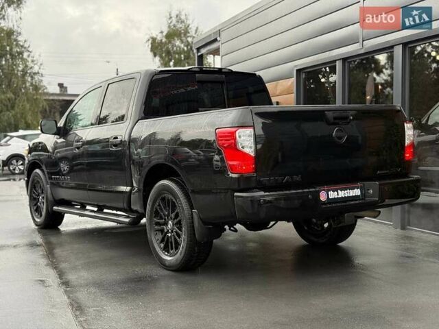 Черный Ниссан Титан, объемом двигателя 5.56 л и пробегом 160 тыс. км за 29999 $, фото 8 на Automoto.ua