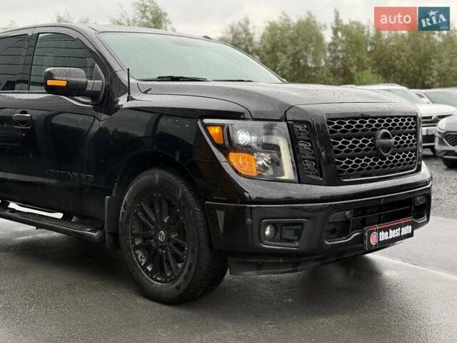 Черный Ниссан Титан, объемом двигателя 5.56 л и пробегом 160 тыс. км за 29999 $, фото 12 на Automoto.ua