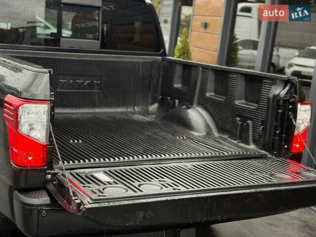 Черный Ниссан Титан, объемом двигателя 5.56 л и пробегом 160 тыс. км за 29999 $, фото 66 на Automoto.ua