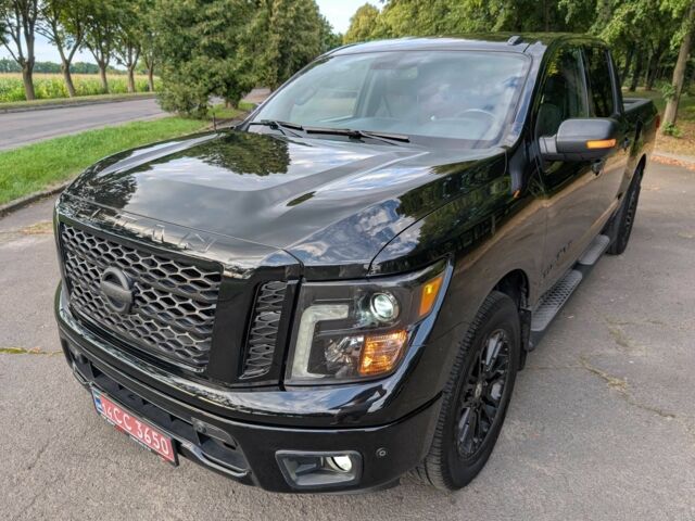 Черный Ниссан Титан, объемом двигателя 5.6 л и пробегом 160 тыс. км за 26999 $, фото 15 на Automoto.ua