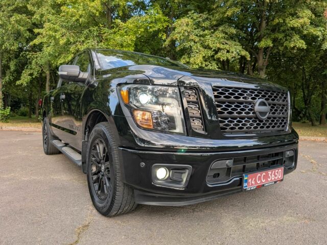 Черный Ниссан Титан, объемом двигателя 5.6 л и пробегом 160 тыс. км за 26999 $, фото 13 на Automoto.ua