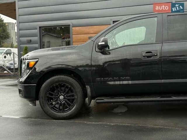 Черный Ниссан Титан, объемом двигателя 5.56 л и пробегом 160 тыс. км за 29999 $, фото 6 на Automoto.ua