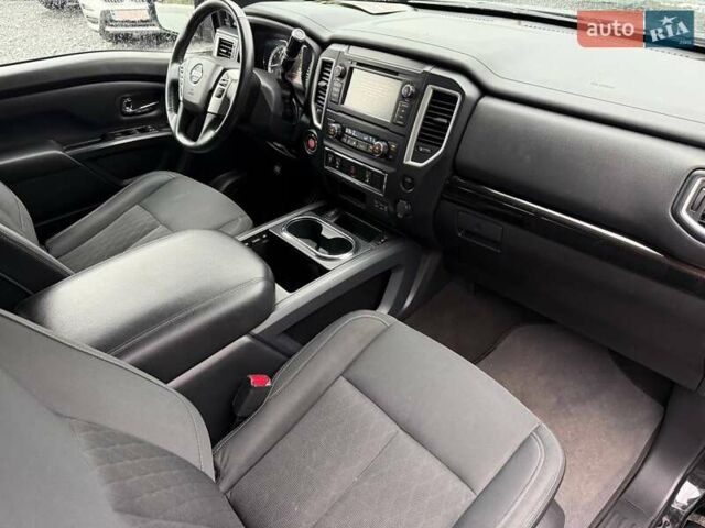 Черный Ниссан Титан, объемом двигателя 5.56 л и пробегом 160 тыс. км за 29999 $, фото 61 на Automoto.ua