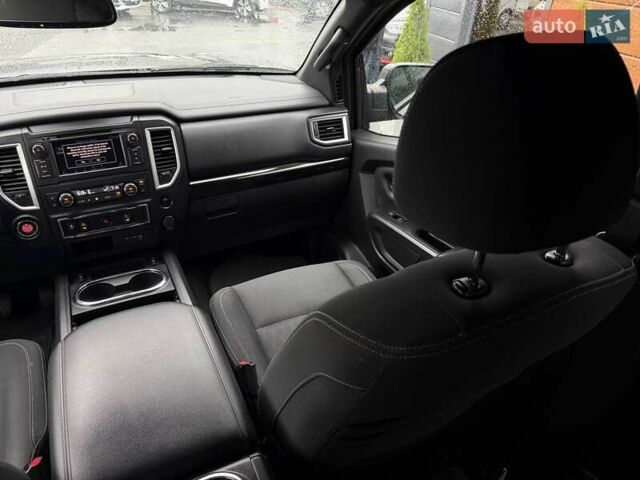 Черный Ниссан Титан, объемом двигателя 5.56 л и пробегом 160 тыс. км за 29999 $, фото 51 на Automoto.ua