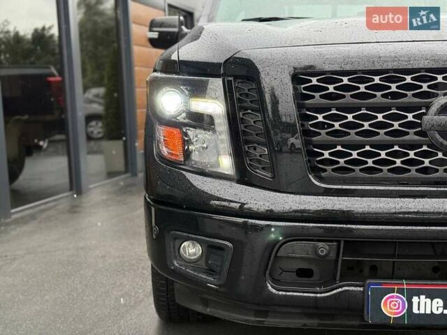 Черный Ниссан Титан, объемом двигателя 5.56 л и пробегом 160 тыс. км за 29999 $, фото 13 на Automoto.ua