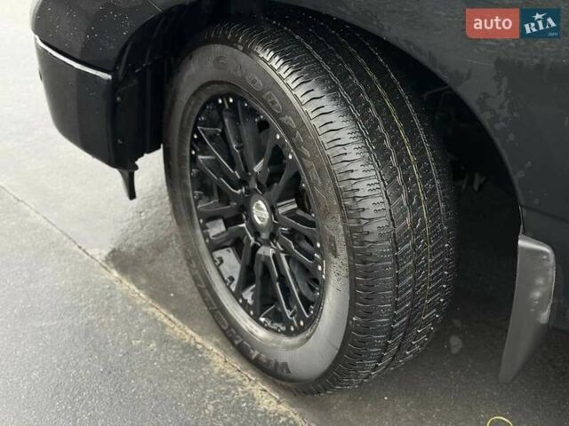 Черный Ниссан Титан, объемом двигателя 5.56 л и пробегом 160 тыс. км за 29999 $, фото 4 на Automoto.ua