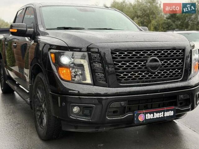 Черный Ниссан Титан, объемом двигателя 5.56 л и пробегом 160 тыс. км за 29999 $, фото 11 на Automoto.ua