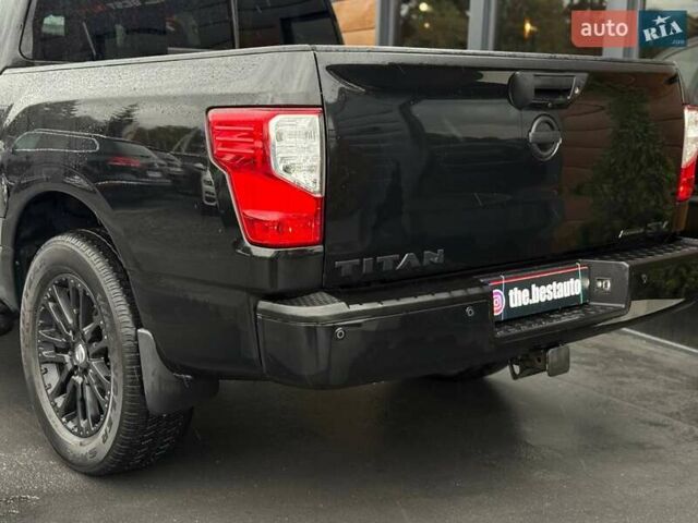 Черный Ниссан Титан, объемом двигателя 5.56 л и пробегом 160 тыс. км за 29999 $, фото 9 на Automoto.ua