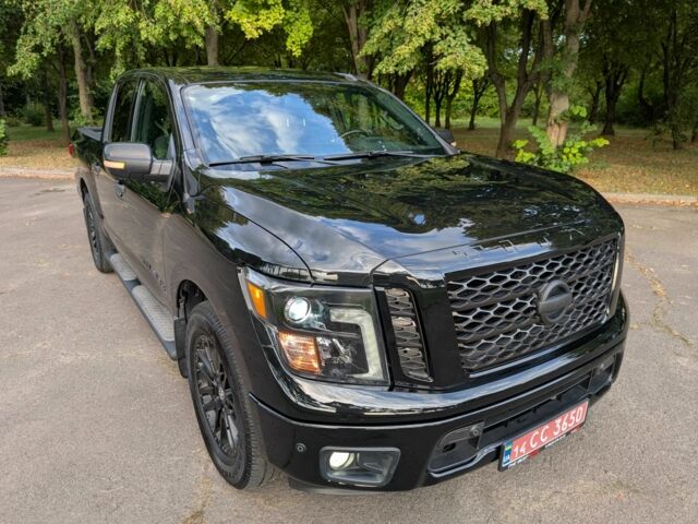 Черный Ниссан Титан, объемом двигателя 5.6 л и пробегом 160 тыс. км за 26999 $, фото 14 на Automoto.ua